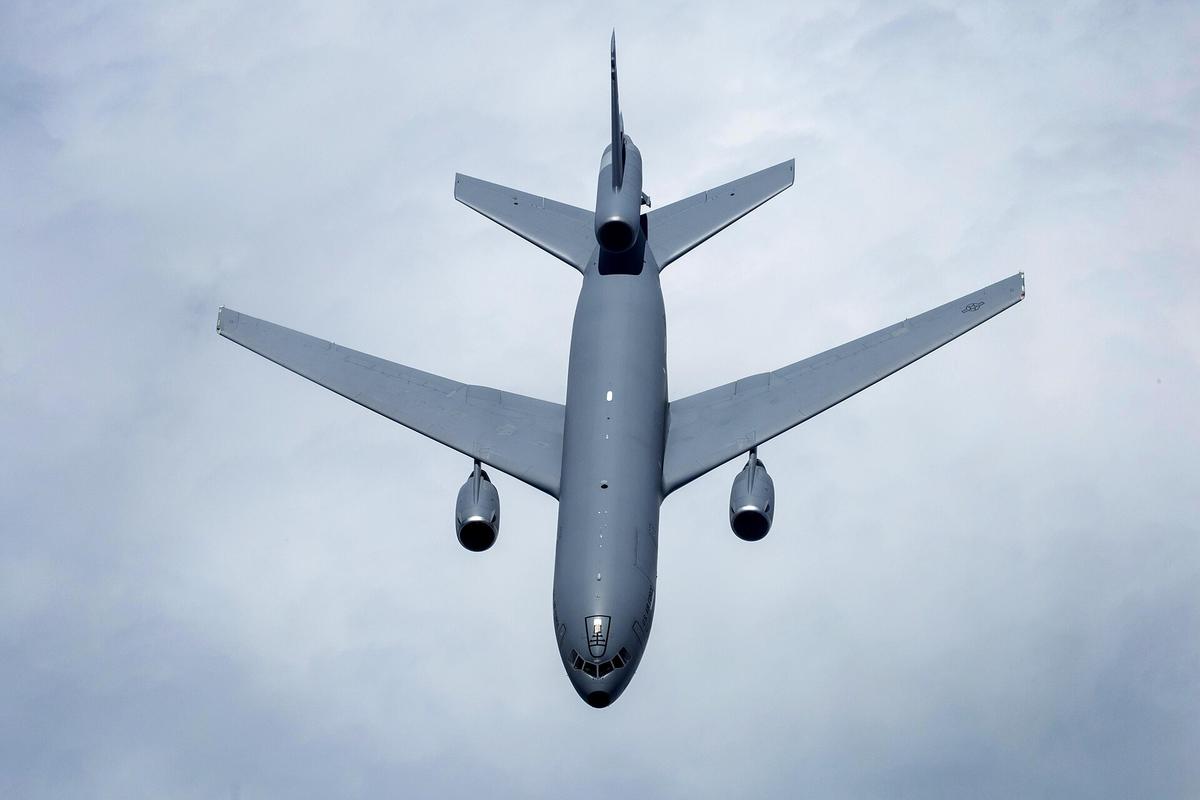 aircraft wing over ocean