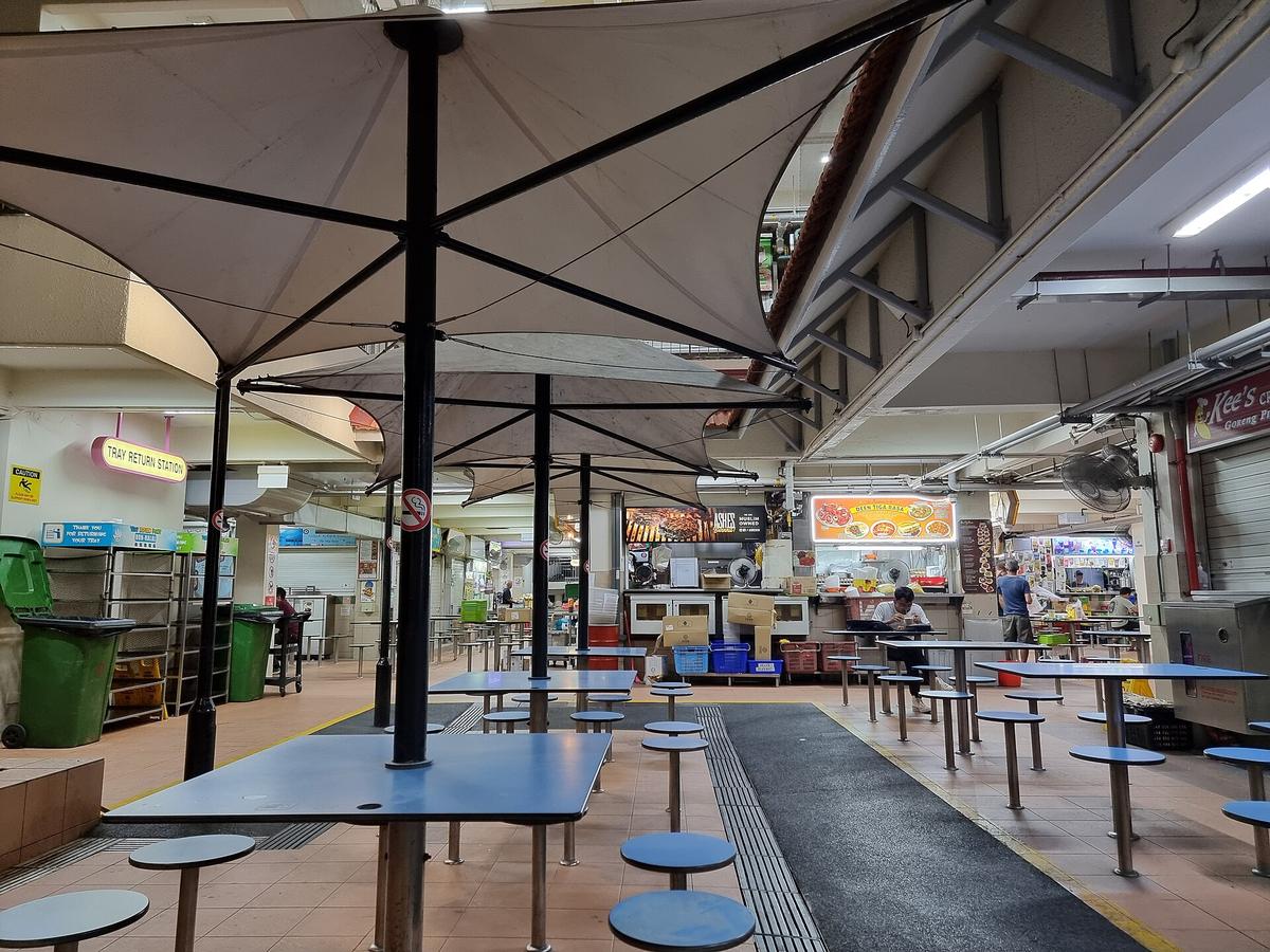 Singapore hawker centre interior tables
